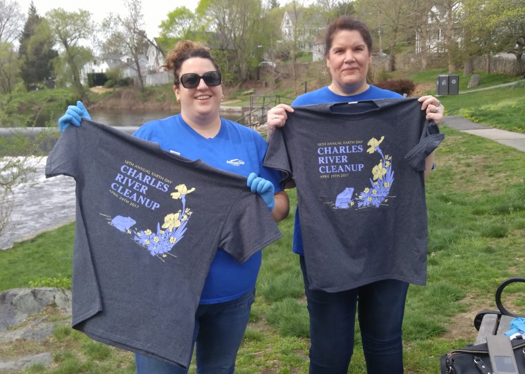 MutualOne Bank Employees holding "Charles River Cleanup" shirts