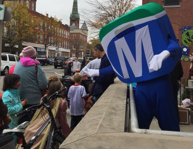 Mo saying hi to children in the Natick Halloween Parade