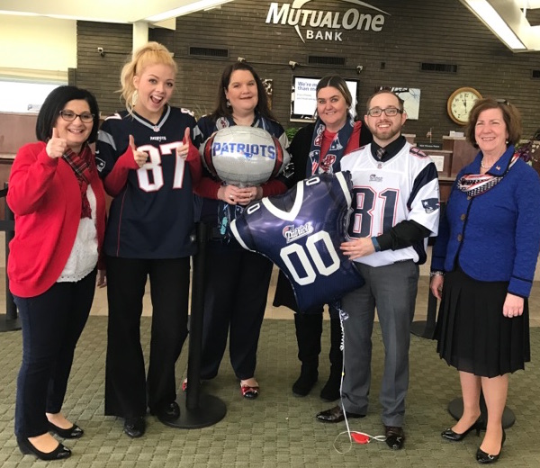 MutualOne Bank employees wearing New England Patriots spirit-wear