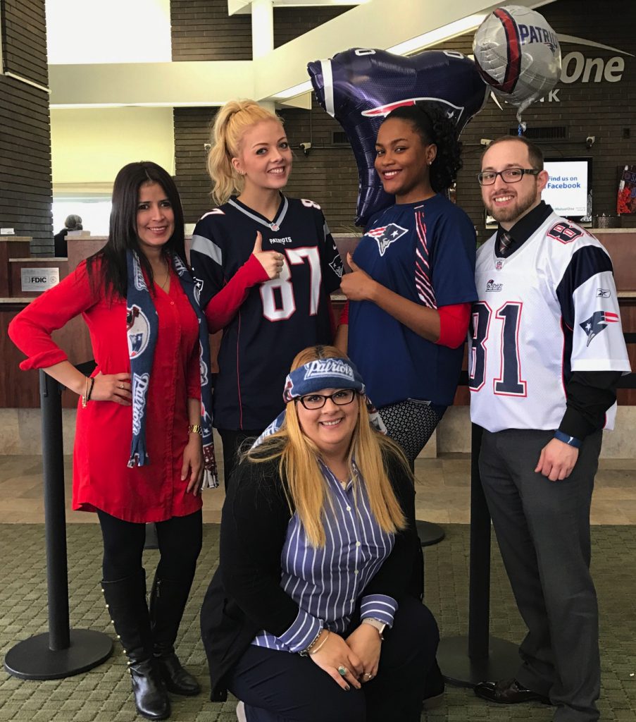 MutualOne Bank employees wearing New England Patriots spirit-wear