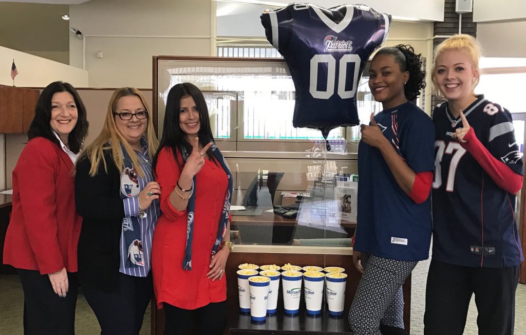 MutualOne Bank employees wearing New England Patriots spirit-wear