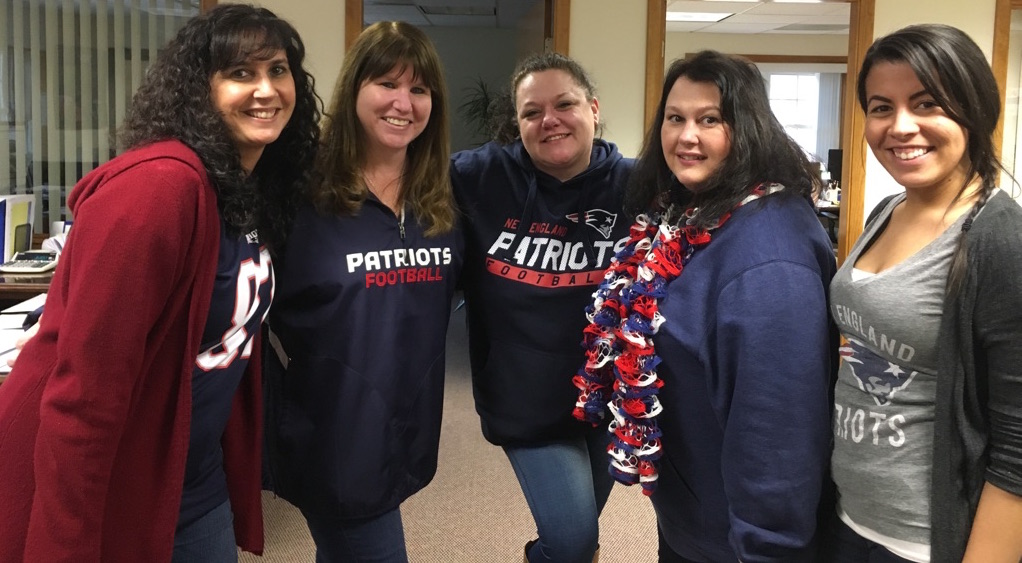 MutualOne Bank employees wearing New England Patriots spirit-wear