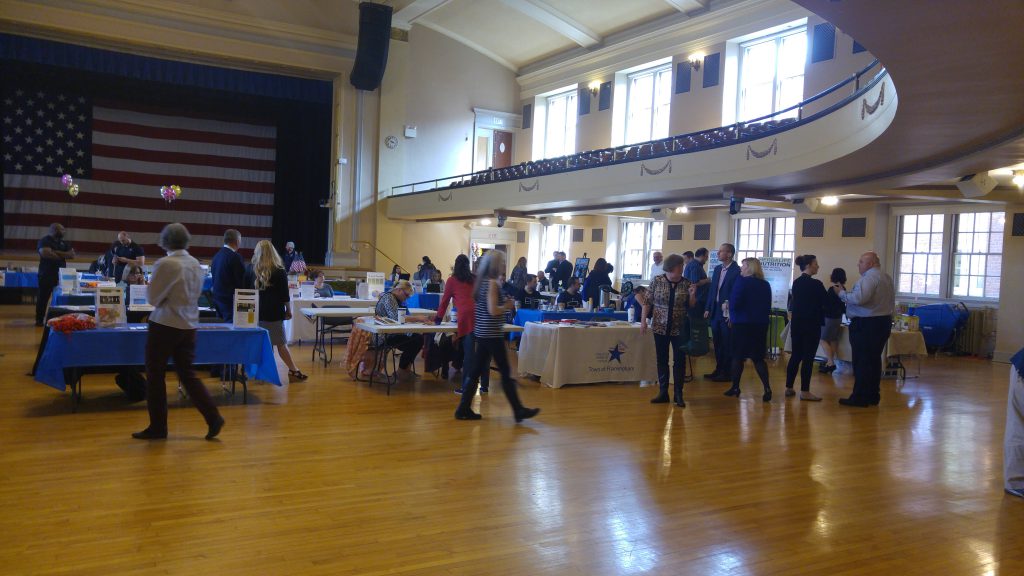 Guests stopping by booths at Health Fair