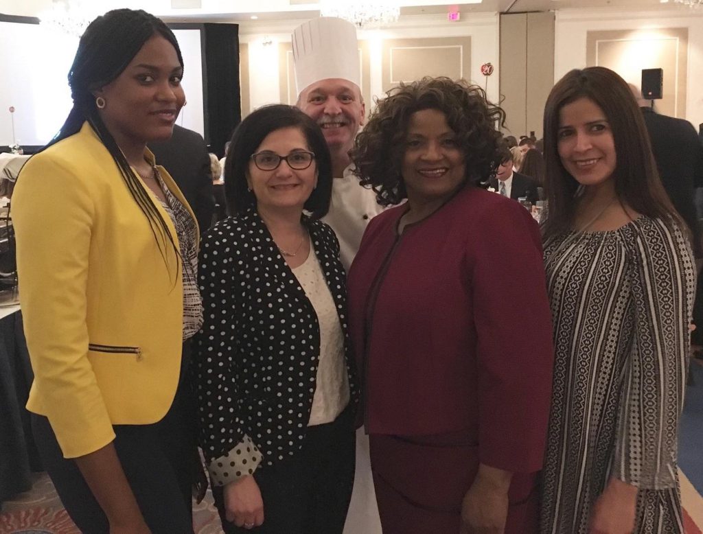 MutualOne Bank Employees posing with chef of AEFI Gala