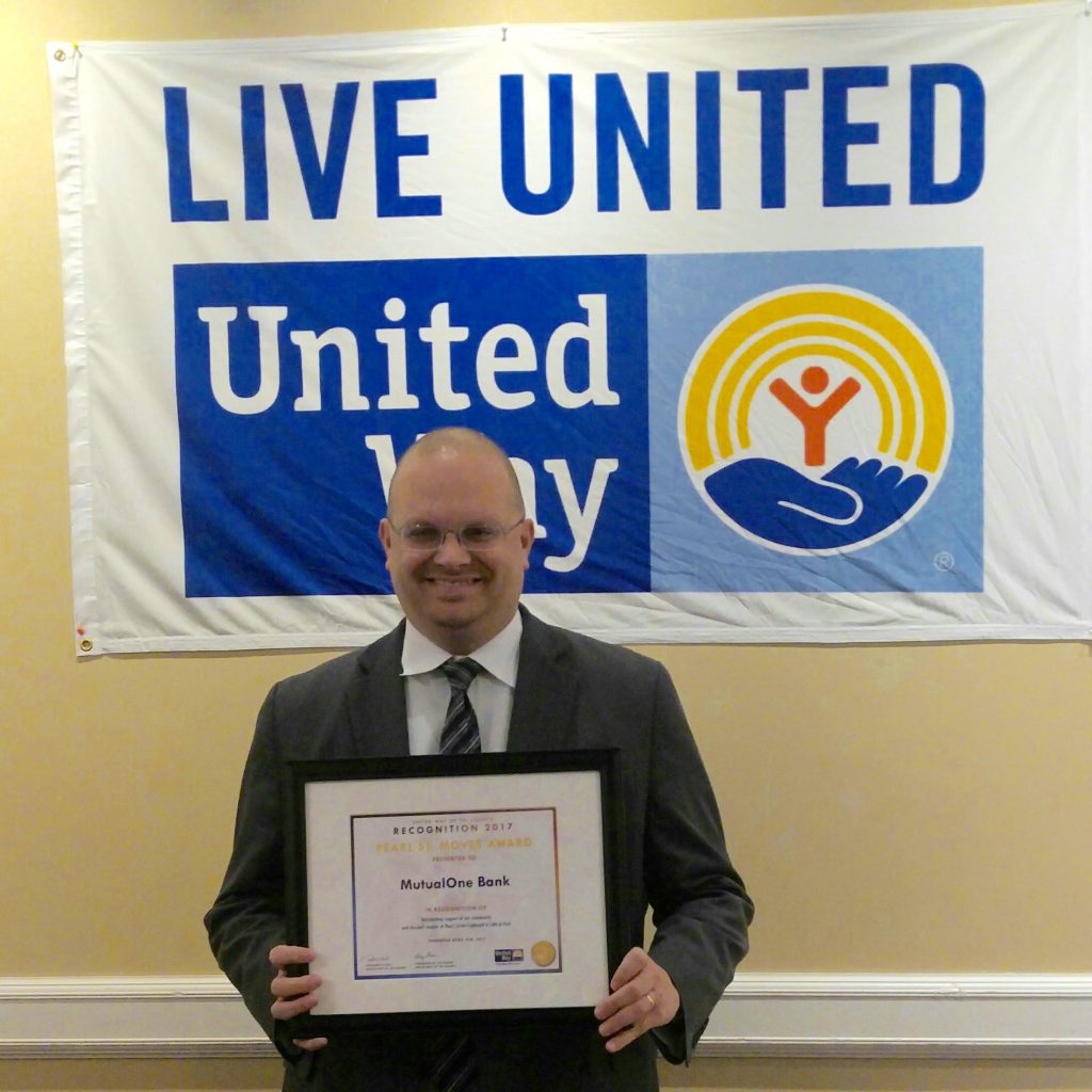 Greg with United Way Award