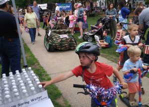 July 4th 2017 Parade kid gets water