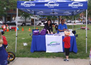 July 4th 2017 MutualOne Employees handing out goodies