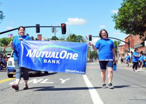 July 4th 2017 MutualOne employees hold our banner