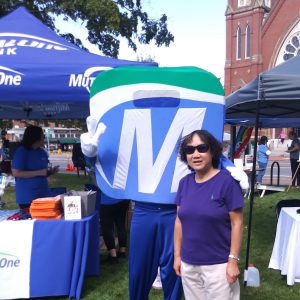 Natick Days Mo with woman at MutualOne tent