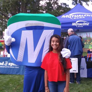 Natick Days Mo with girl in red shirt