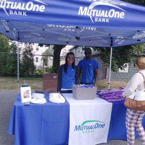 Employees at MutualOne tent