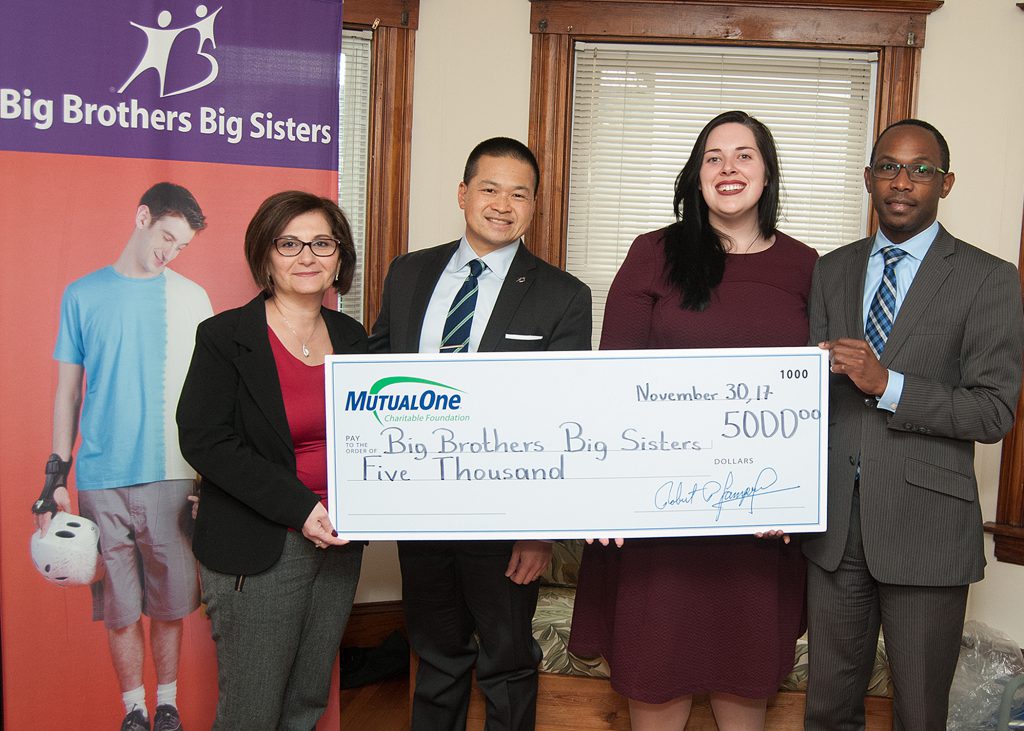 Celebrating the MutualOne Charitable Foundation’s $5,000 grant to Big Brothers Big Sisters are (l-r) Yasmine Ouweijan, assistant vice president & manager of the MutualOne Bank Concord Street, Framingham office; Jeffrey Chin, CEO of Big Brothers Big Sisters; Kalyn Archambault, corporate programs specialist at Big Brothers Big Sisters; and Yves Munyankindi, MutualOne Banks’ retail support & charitable foundation administrator.