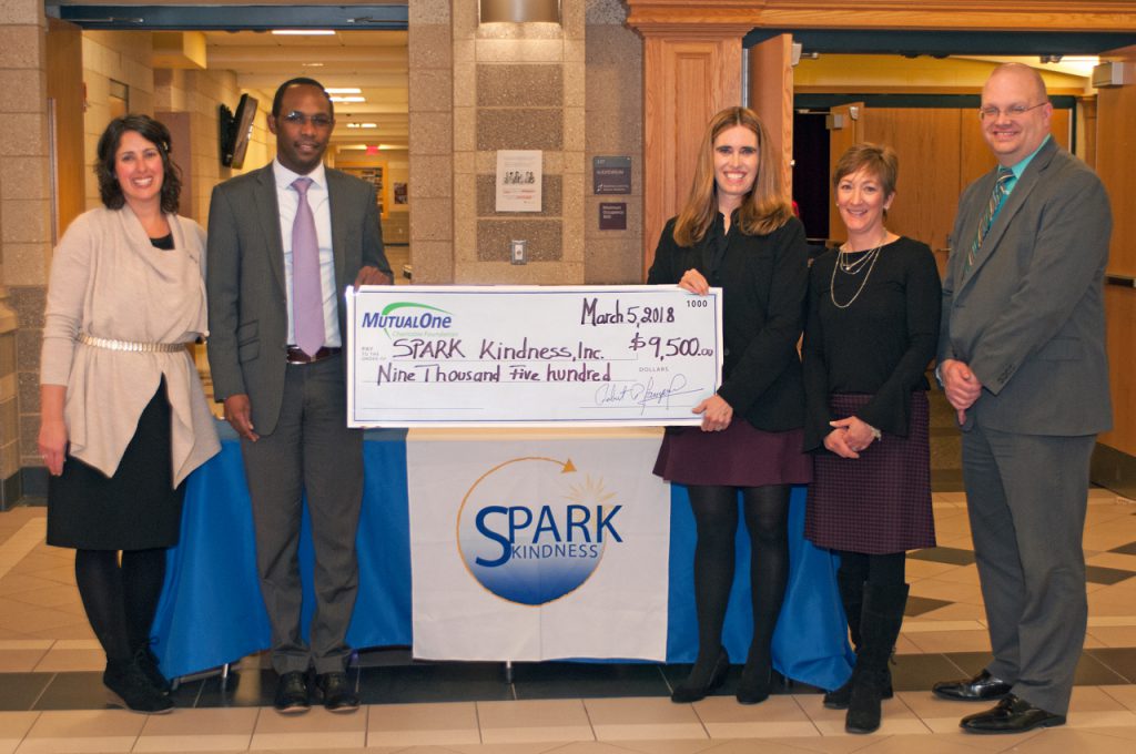 Charitable Foundation check presentation to SPARK Kindness