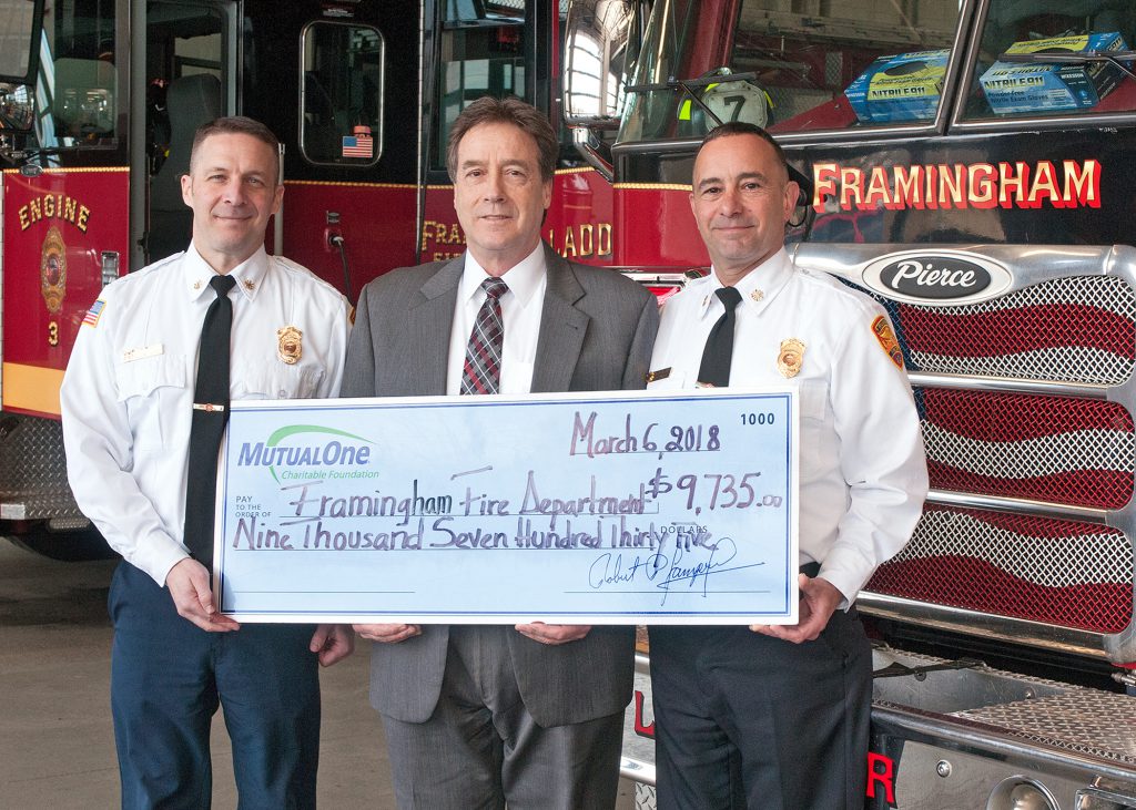 Observing the recent $9,735 MutualOne Charitable Foundation grant to the Framingham Fire Department for the introduction of a new proactive public safety plan in the city’s schools are (from left) Michael Dutcher, Assistant Chief for the Framingham Fire Department; Mark R. Haranas, President and CEO of MutualOne Bank; and Joseph C. Hicks, Chief of Department for the Framingham Fire Department.