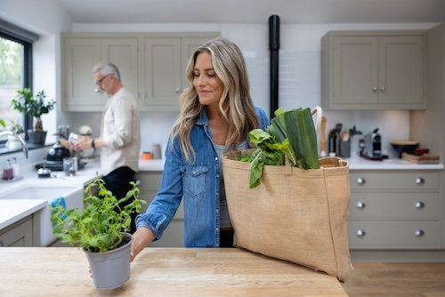 Couple unpacking groceries