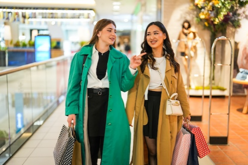 Two women shopping in the mall