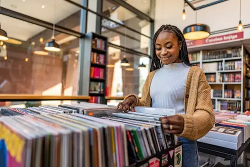 Woman looking at records