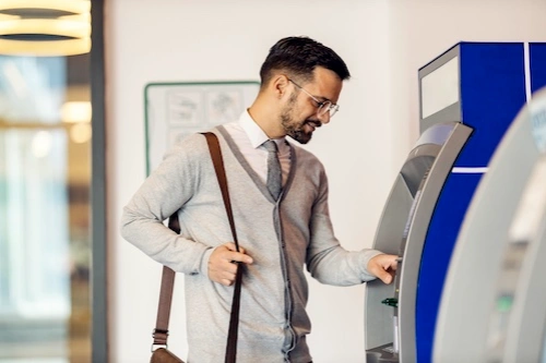 Business person getting cash