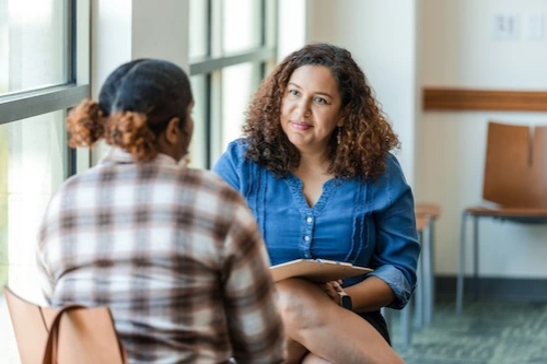 Woman working with a client
