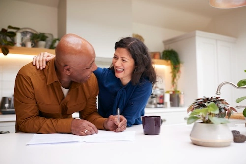 Two people reviewing paperwork