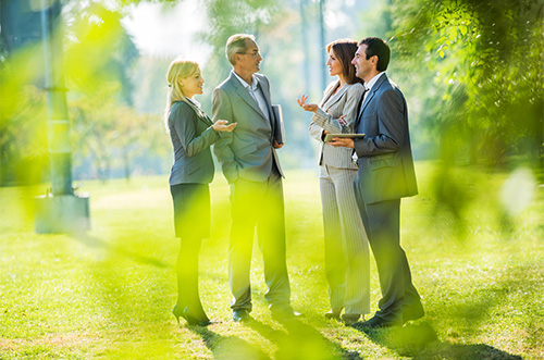 Business people standing outside