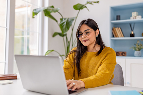 Woman on laptop at home