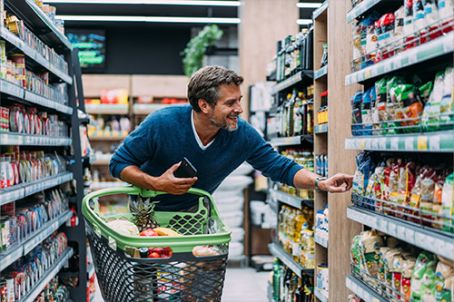 Man grocery shopping